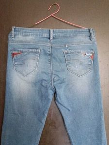 Ripped Knee Denim Jeans