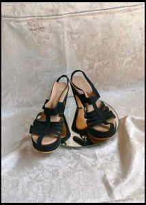 bow platform heels and  black high heel