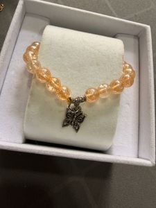 Set of 4 Beaded Bracelets with Charm