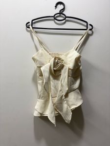 Off white flowy strap top with flower detailing