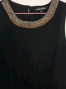Elegant Black Dress with Embellished Neckline