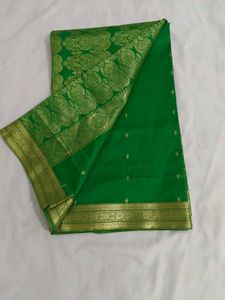 Vibrant Green Silk Saree with Golden Border