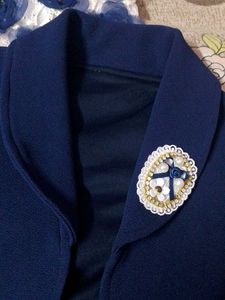 This elegant navy blue and white body dress featur