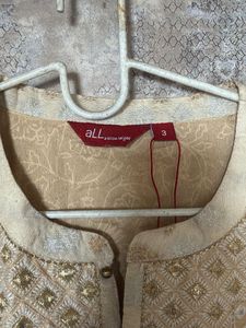 Elegant Printed Kurta with Embellished Neckline