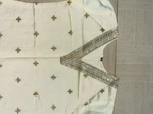 Embroidered Cream Silk Straight Kurta Pant Set.
