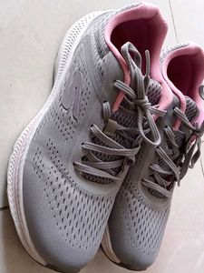 Gray Running Shoes with Pink Accents