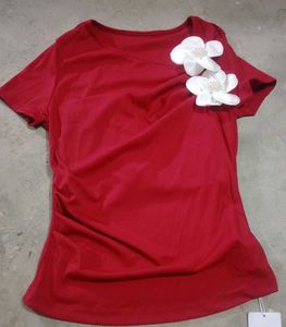 Chic Red Top with Floral Accent