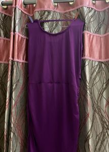Elegant Purple Ruched Dress with Floral Accent