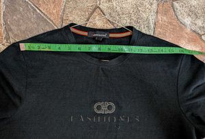 Stylish Black T-Shirt with Gold Emblem