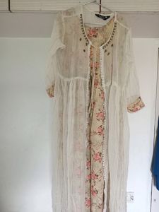 Kurti With Koti.  Never Used. I Bought It From Pune. N Didn't Try It. Bcs It Doesn't Fit Me I Could Never Get Chance To Wear It