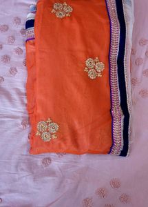Elegant Orange n cream net  Saree
