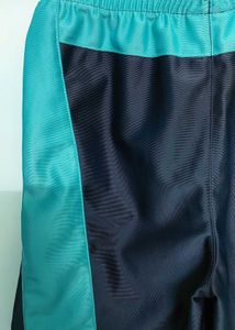 Navy blue and cyan Adidas shorts that combines spo