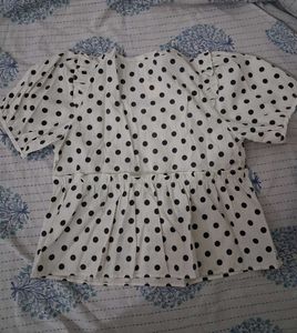 white polka dot top