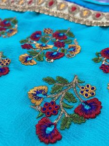 Elegant Teal Embroidered Saree