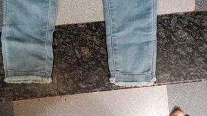 Light Wash Distressed Hem Jeans