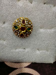 golden ring with Red and green stone