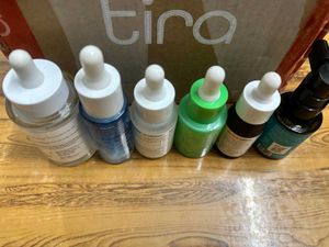 Assorted skincare glass empties