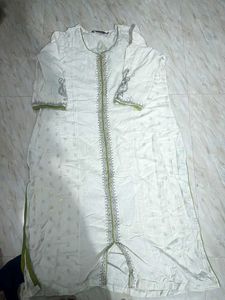 Elegant White Kurta with Green Trim