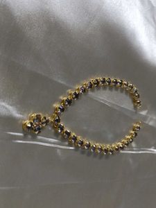 Elegant Gold Chain with Dark Stones