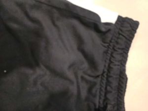 Comfortable Black Pants with white strips on the s