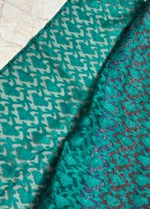 Exquisite Teal Saree with Embellished Border