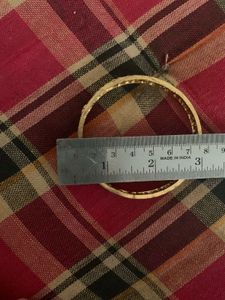 Elegant Gold Bangles with Stone Accents