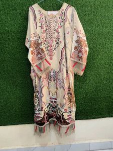 Elegant Beige Kurta with Intricate Embroidery