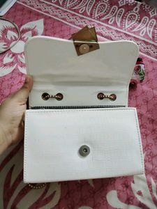 26.Chic White Clutch with Gold Chain