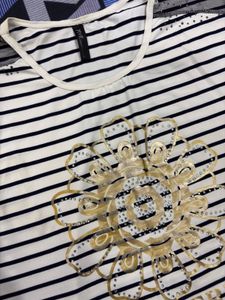 Chic Striped Top with Embellished Flower
