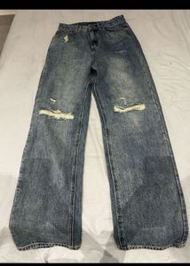 Distressed Blue Wide-Leg Jeans with black shirt