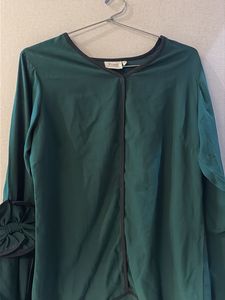 Elegant Green Top with Bow Detail