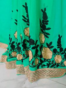 Elegant Green Embroidered Saree