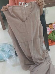 embellished jumpsuit with attached sleeves