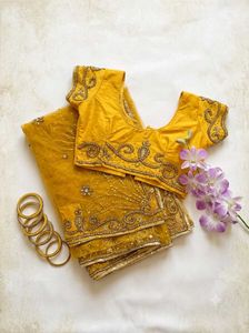 Stunning Yellow Embroidered Kundan Saree