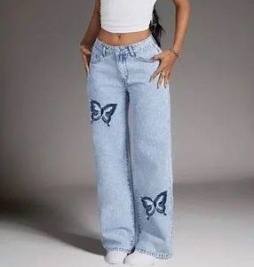 Light Wash Wide Leg Jeans with Butterfly Detail
