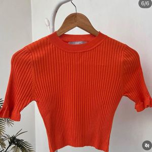 Orange Ribbed Cropped Top