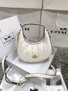 COACH* *CARMEN MINI CROSSBODY BAG IN QUILTED LEATH