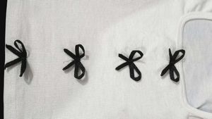 White Cut-Out Top with Bow Detail