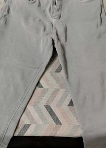 Grey women jeans with light green top