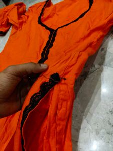 Bright Orange Kurta with Black Trim