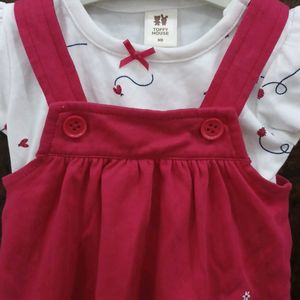 red and white dungree style frock.for newborn girls. wore only once. recently purchased