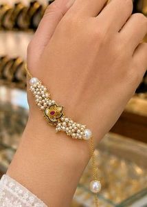 Elegant Pearl and Gold Bracelet