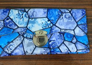 Floral Print Blue Clutch .