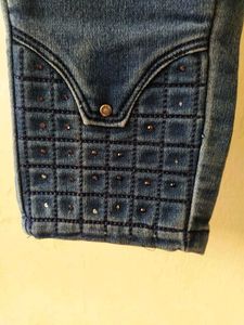 High Waisted Blue Jeans with Embellished Cuffs