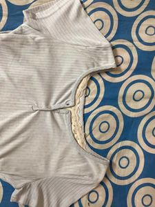 Faded light blue Ribbed Henley Top with Floral Lay