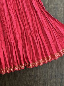 Vibrant Pink lehenga with Gold Accents