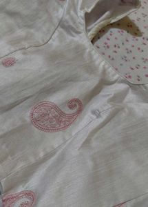 Elegant Pink Saree with Paisley Embroidery