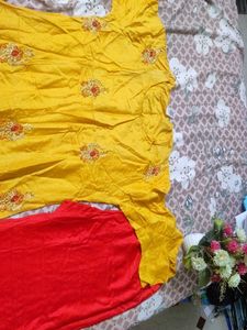 Embroidered Yellow Kurta with Red Salwar