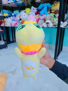 Cute Yellow Plush Toy with Big Green Eyes