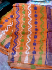 Orange Saree with Vibrant Patterns